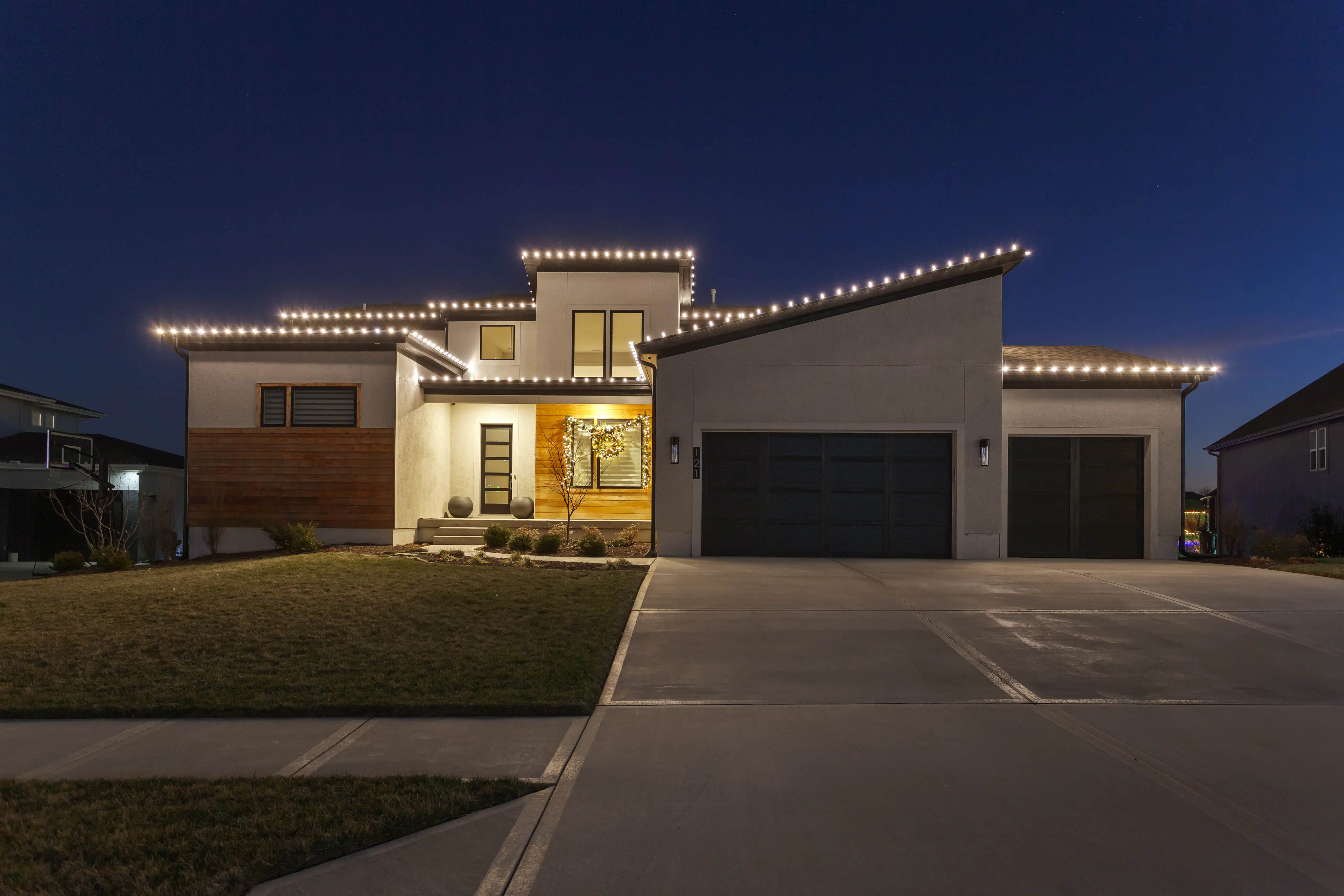 Holiday lighting installation on a home in Lee's Summit, MO